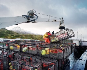 Stacking Crab Pots in Alaska by Corey Arnold